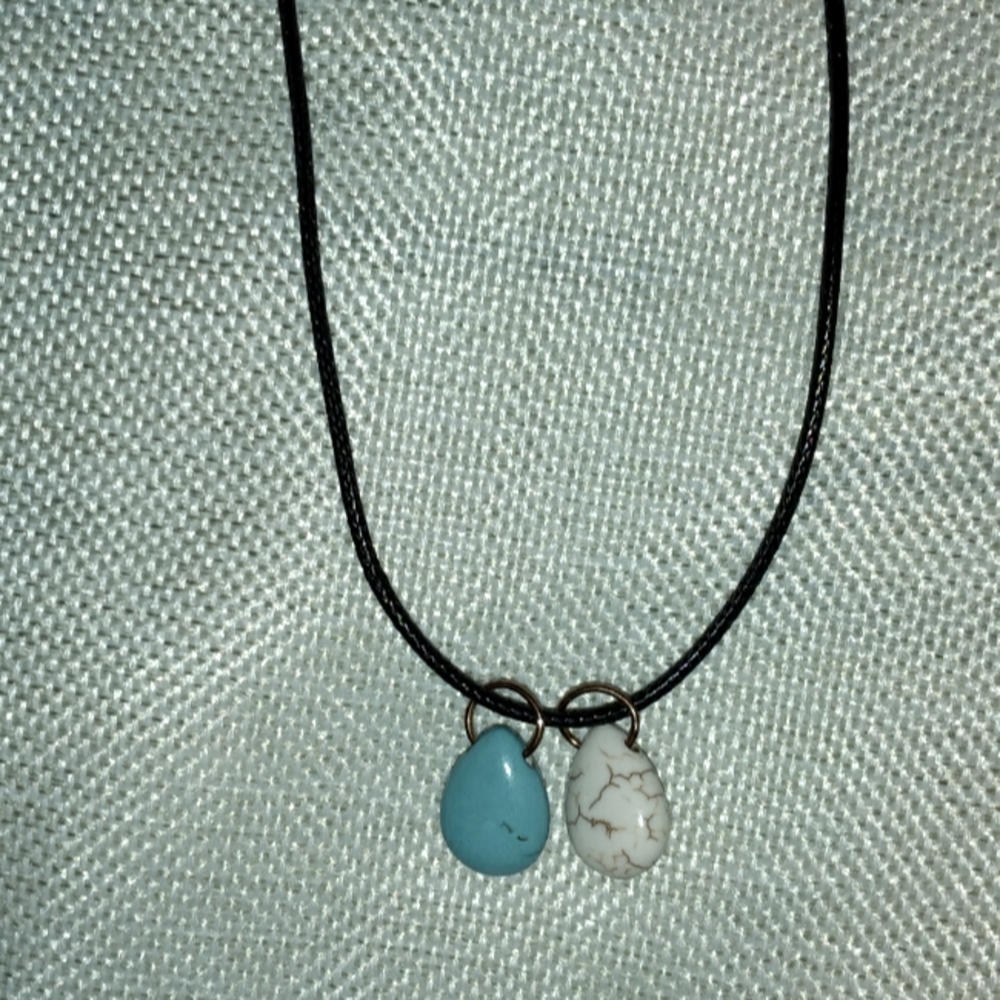 Pretty blue and white 2 moon necklace.